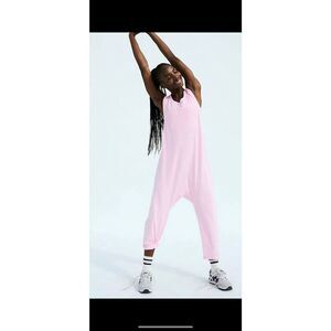 NWOT FP Movement by Free People Hot Shot Twist Back Onesie in Pink Fusion Small